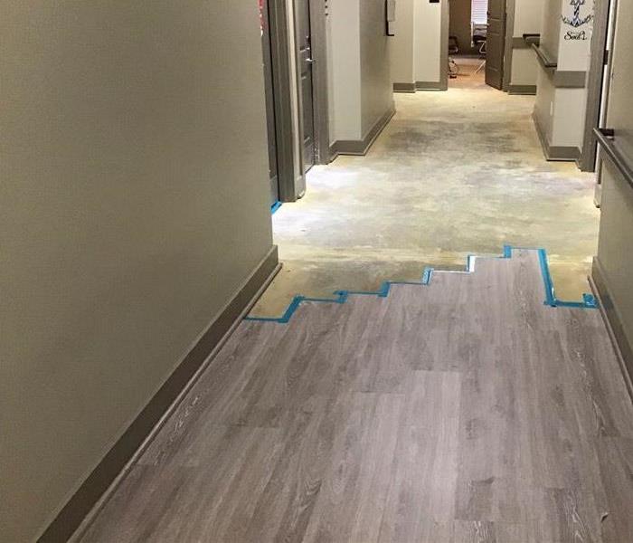 A dry apartment hallway after water damages