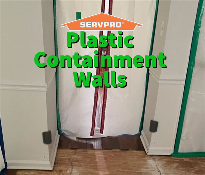 A plastic containment wall set up by the professionals at SERVPRO