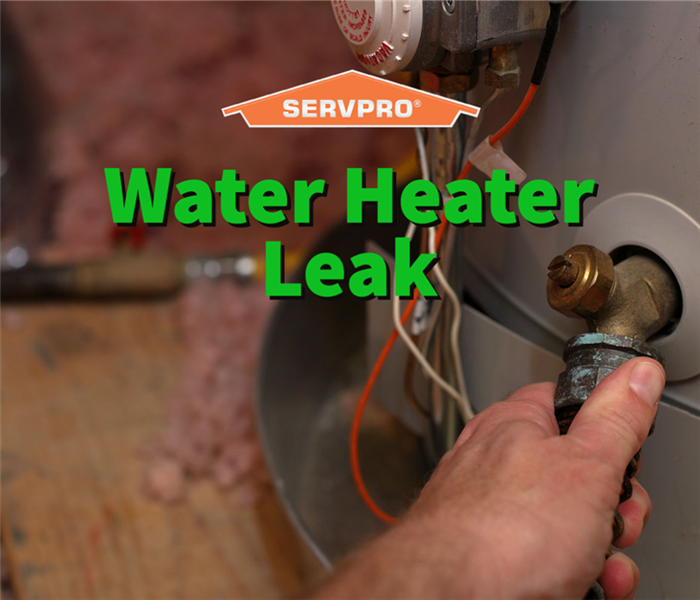 A SERVPRO professional fixing a water heater leak